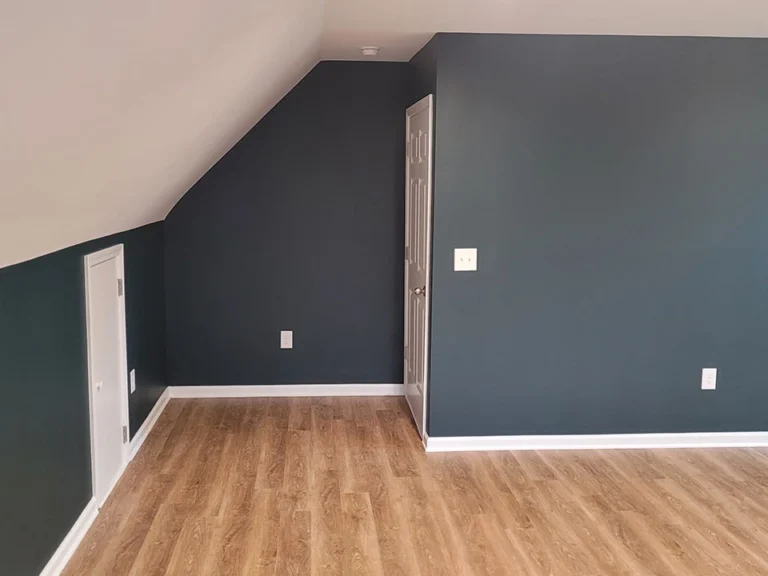 Custom wall panelling and painted trim in a Raleigh living space