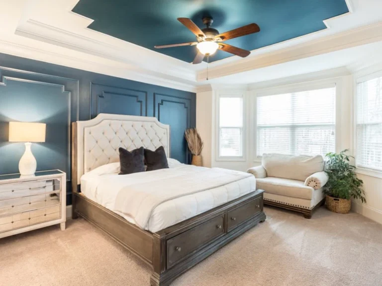 Interior room with custom wall panelling, painted trim and new interior doors