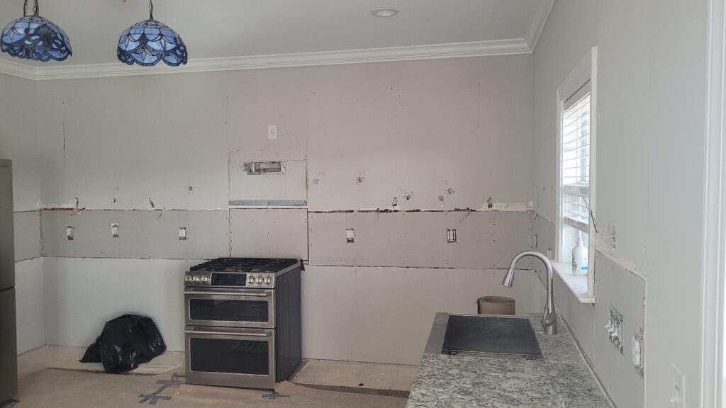 Kitchen remodel in progress with new cabinetry going in